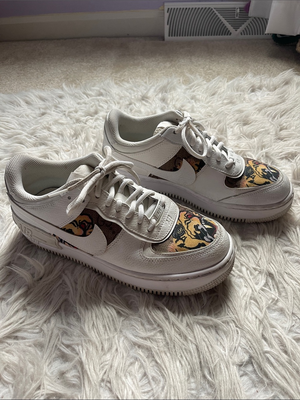 Nike White Sneakers with Tiger Accent